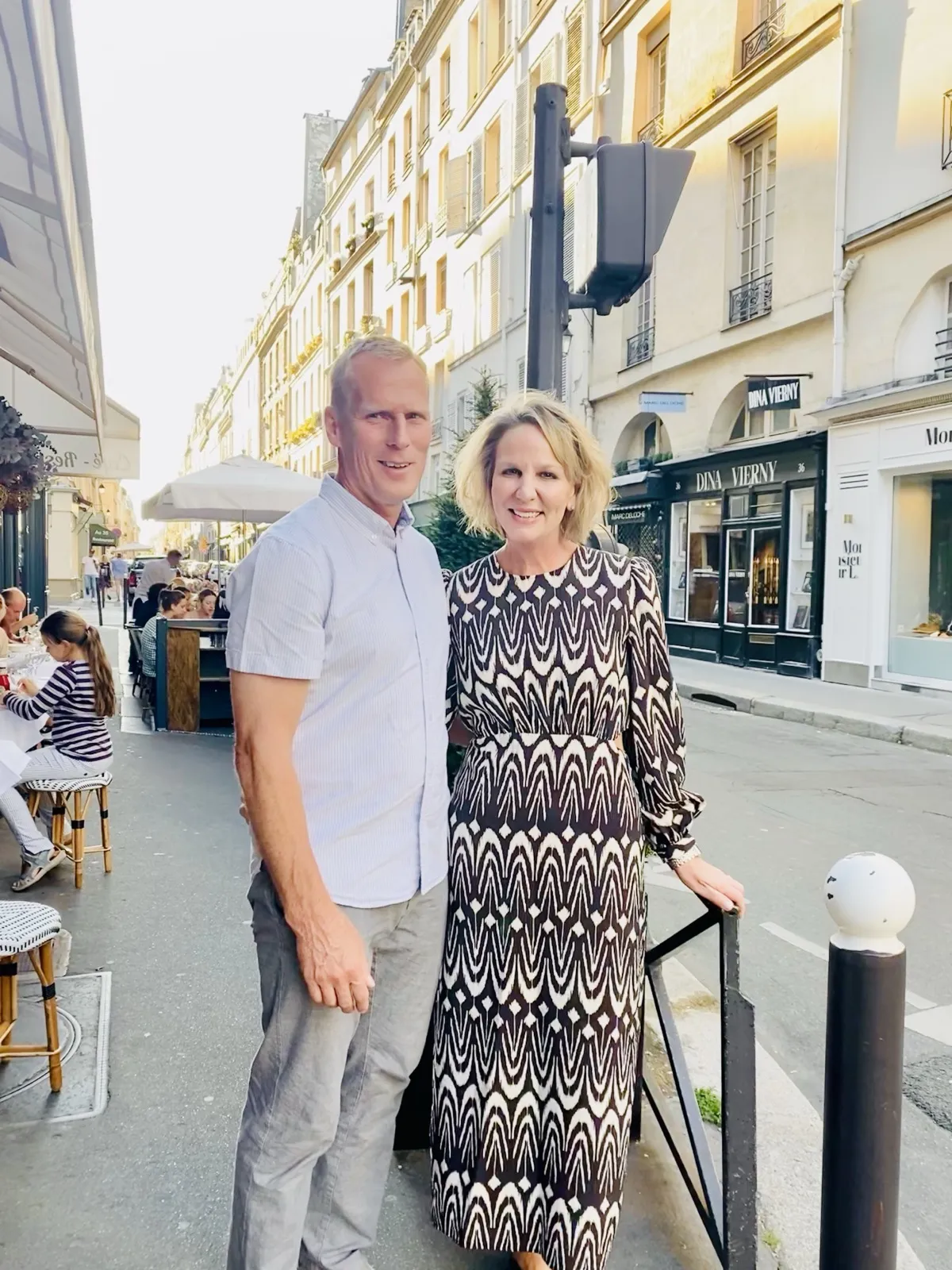 Gianna and her husband on a street in Saint-Germain-des-Prés, Paris